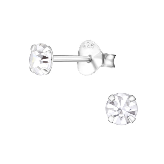 4mm Round Ear Studs- Earrings Made from Sterling Silver  Small and comfortable, these reflective stud earrings will glimmer and sparkle all day and night! Wear these alone and pair with an earring stack! 