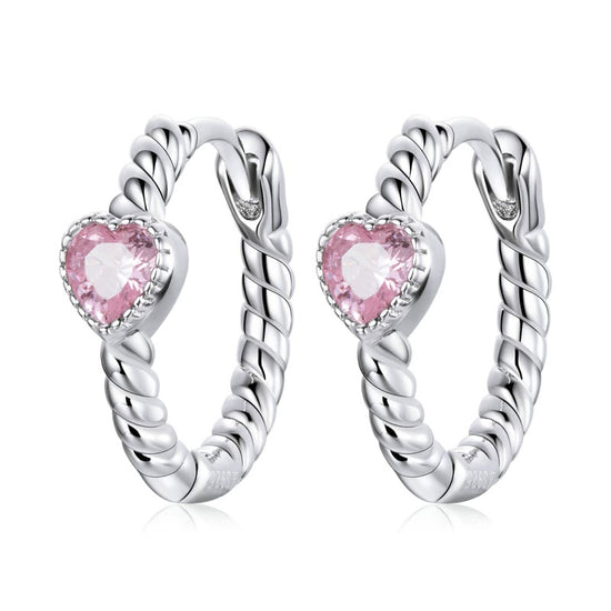 pink heart gems on a curved croissant sterling silver huggie hoop